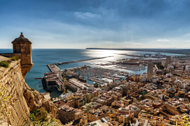 From atop mount Benacantil, a view of part of historic Castel Santa Barbara, Alicante marina and old city.